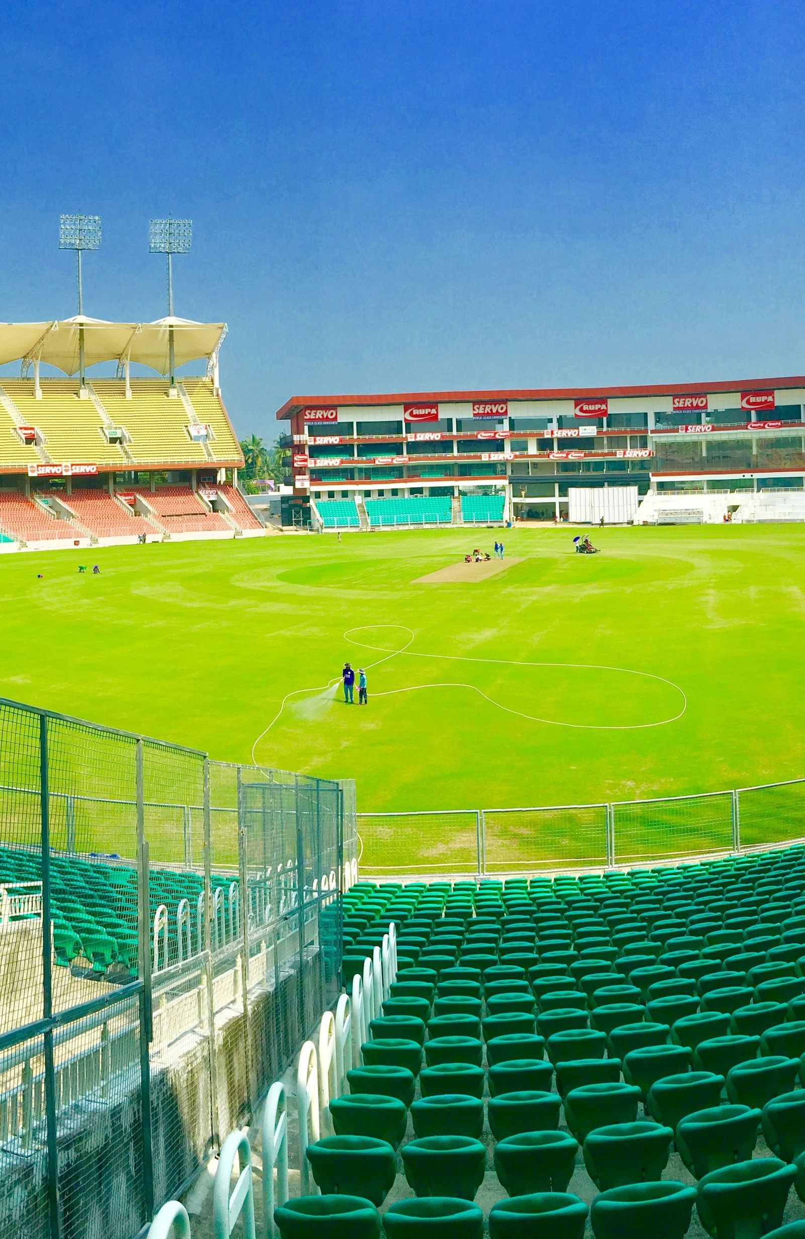 An image of Cap siechem Ground featuring seating arrangements for mass crowd, an open ground, and light poles